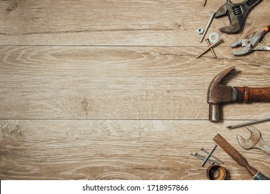 Used tools on wooden workbench - Powered by Shutterstock