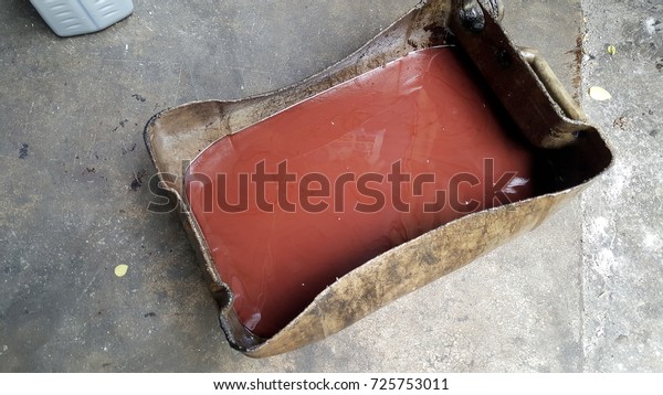 used transmission
oil is red color and dirty