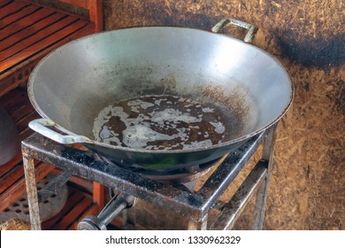 Used Vegetable Oil And Black In The Pan.