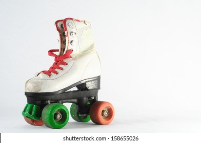 Used Vintage Consumed Roller Skate on a White Background