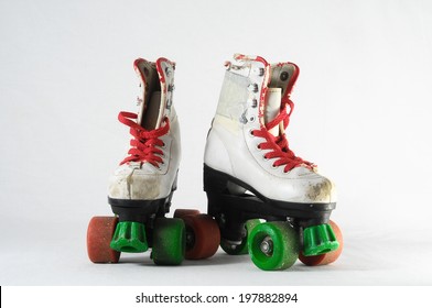 Used Vintage Consumed Roller Skate on a White Background