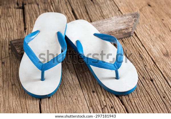 white and blue slippers