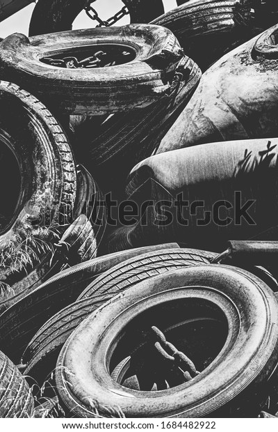 Used and worn huge tires\
cemetery