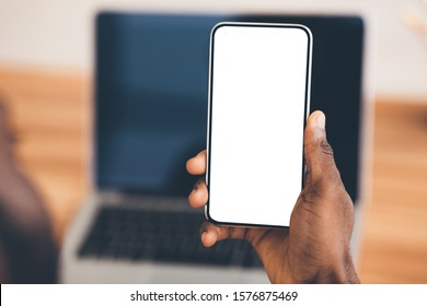 Useful App. Close-up Of Black Man Holding Mobile Phone With White Blank Screen. Mock Up, Rear View