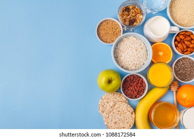Useful breakfast on a blue pastel background, top view.