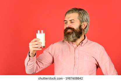 Usefulness Of Milk. Dairy Products From Milk For Adults And Children. Happy Farmer Present Glass. Bearded Man Drink Useful Milk. Love Milk Mustache. Food And Drink Concept