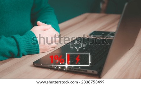 User is angry and frustrated when he learns that his laptop computer's battery is dead and did not bring the charger adapter. Concept of Technology and daily life of freelance. No power battery. ストックフォト © 