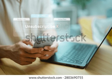 User cancels a recurring subscription through a mobile device while reviewing membership plans and billing options online.