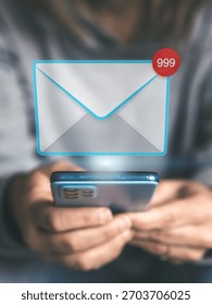User Checking a Smartphone Displaying a Massive Email Overload Notification with 999 Unread Messages Badge