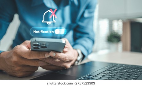 User disabling mobile notifications using do not disturb settings on smartphone. Concept of digital focus mode, notification control, quiet productivity, and managing alerts.