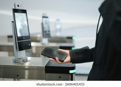 User Engaging with High-Tech Access Control System at Security Checkpoint  