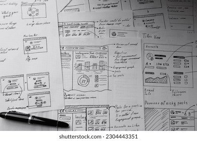 User experience design wireframes of IT product. Hand drawn projects. Brainstorming. Sketch of ideas, black and white. Complex project, education	