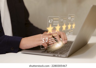 User give five star rating to service experience on computer app. Customers opinion evaluate the quality of services to reputation and business success. Customer review satisfaction survey concept. - Shutterstock ID 2280305467