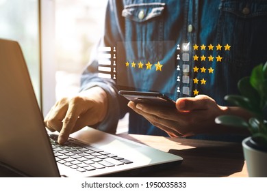 User give rating to service experience on online application, Customer review satisfaction feedback survey concept, Customer can evaluate quality of service leading to reputation ranking of business. - Shutterstock ID 1950035833