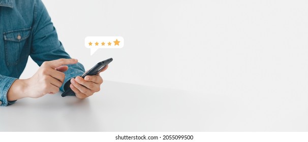 User give rating to service experience online application  Customer review satisfaction feedback survey concept  Customer can evaluate quality service leading to reputation ranking business 
