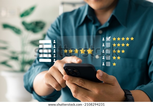 User give rating to service experience on
online application, Customer review satisfaction feedback survey
concept, Customer can evaluate quality of service leading to
reputation ranking of
business.
