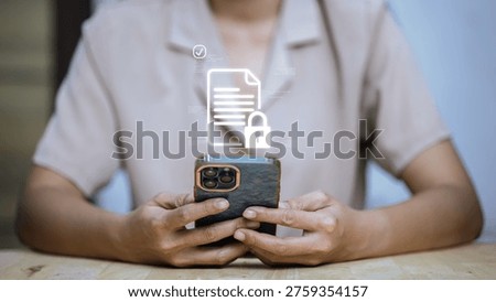 User holding smartphone with secure document protection interface, showing data encryption, authentication, and privacy verification for safe mobile access and cybersecurity in digital environment.