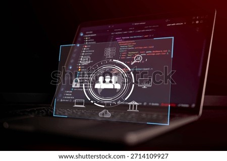 User interface icon with team management and data analytics symbol overlay on laptop screen showing source code, representing digital transformation and cybersecurity in software development.