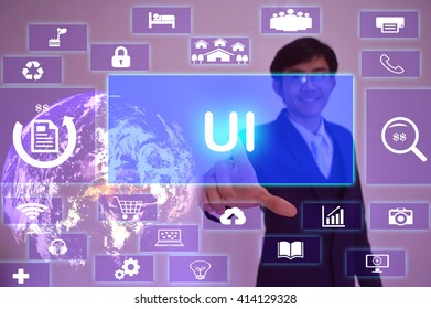 User Interface(UI) concept  presented by  businessman touching on  virtual  screen ,image element furnished by NASA