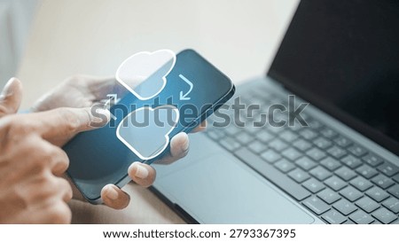 User managing cloud backup and file synchronization on a smartphone, representing cloud computing, secure data transfer, online storage, digital infrastructure, and seamless connectivity.