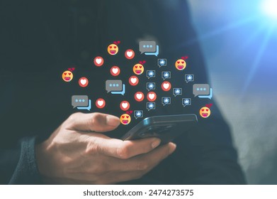 User playing Social media technology, Social media marketing concept hand using smartphone typing, chatting conversation in chat box icons pop up - Powered by Shutterstock