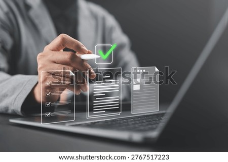 User preparing, checking, and approving documents on virtual screen, representing paperless document management, quality assurance, ERP workflow, and digital approval process.