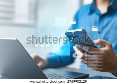 User syncing files on smartphone with cloud interface, representing conflict resolution, version control, and document management in secure digital workflow with real-time synchronization.
