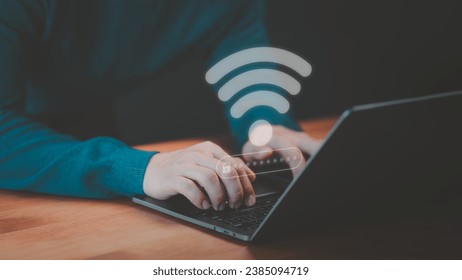 User use a computer laptop to connect to wifi in hotel, but wifi password is incorrect. Working and waiting to loading digital data form website, concept technology of waiting for connect to Wi-Fi.