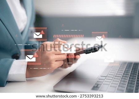User using smartphone with warning email icons showing spam alert phishing attack risk email security protection cyber threat detection and digital communication safety on mobile device