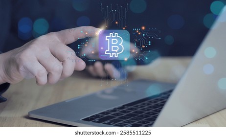 usinessman using computer with Crypto Currency icon in his hand. Male hand holding futuristic BTC chip in the center and circuit board with vibrant data transfers.