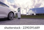 Using of charge station, solar panel and windmill background. Sustainability assessment, renewable energy concept. Electric vehicle using sustainable source, wind generator. Saving, climate change.