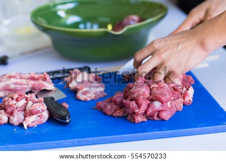 using chopboard wrong color. chopping board for meat is red not blue for seafood, different colors of chop boards in kitchen for prevent contamination. Stock photo © 