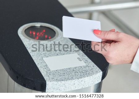 using electronic card key for access through turnstile