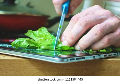 Using an electronic tablet for cooking - Powered by Shutterstock - Get 15% off with code: PIKWIZARD15