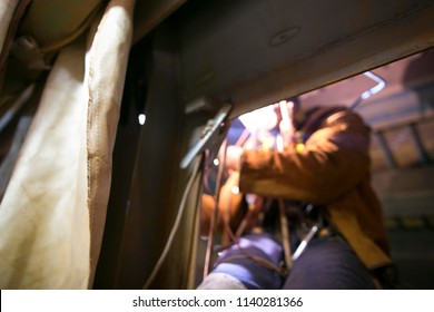 Using Fire Blanket Protection While Rope Access Welder Welding Repairing Inside Confined Space Chute At Construction Mine Site Perth, Australia  