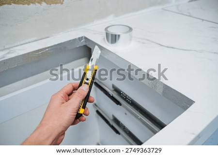 Using Hand Tools For Marble Cutouts. Precision Trimming Of Marble With Manual Cutting Tools. Detailed Process Of Removing Seam Sections From Marble Countertops Using Professional Techniques