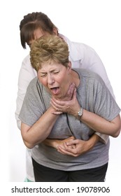 Using The Heimlich Maneuver On A Choking Person