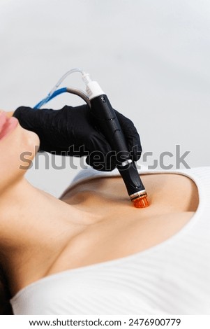 Using hydrafacial hardware cosmetology devise to improve skin condition. Rejuvenating skin with hydrafacial hardware