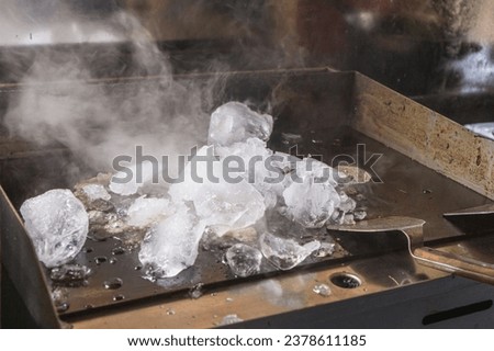 Using ice on a hot griddle is useful for cleaning  grease, and stuck-on residue