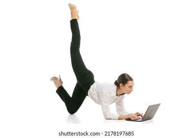 Using Laptop. Young Business Woman Wearing Business Style Outfit In Motion Isolated On White Background. Business, Start-up, Working Open-space, Ballet Or Professional Occupation Concept.