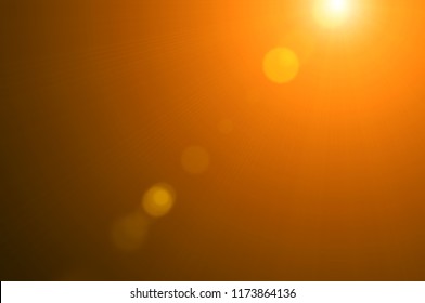 Using lens flare effects for overlay designs or screen blending mode to make high-quality images of warm sunlight isolated on a black background.