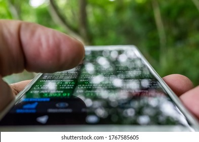 using a mobile device to check market data in the outdoor