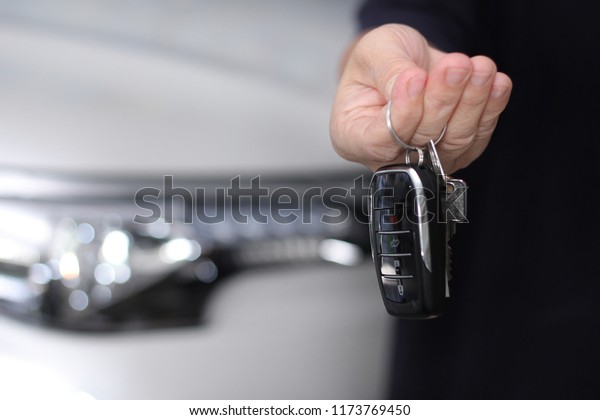 Using  right hand car remote key out the front of \
the car  to send for\
money