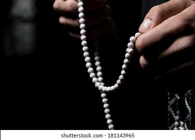 Using Rosary Beads In Hands