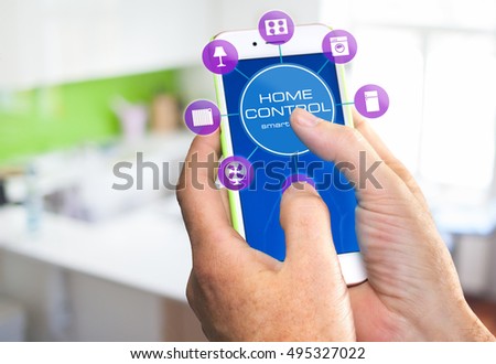 Using smart home app on phone. Smart home, remote control concept.