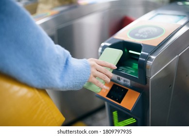 Using Smart Phone To Pay At Subway Station.