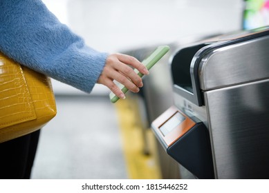 Using Smart Phone To Pay At Subway Station.