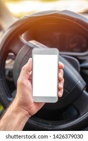 Using Smartphone In Car, Mock Up Blank Screen Of Mobile Phone Device In Hand Of Adult Caucasian Male