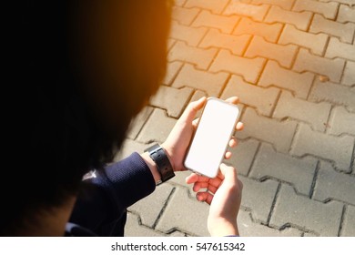 using smartphone in park