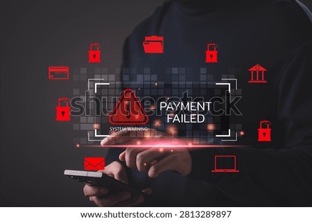 Using smartphone with payment failed warning and cyber attack icons, representing online banking fraud, transaction error, cybersecurity risk, digital payment failure, and financial data protection.